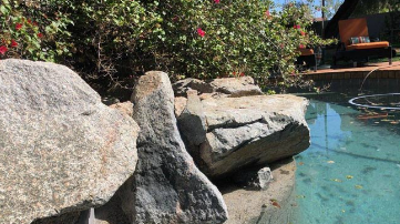 Calcium Deposits on Decorative Rocks Removed