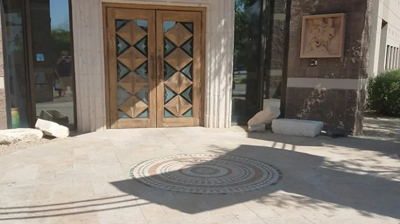 This exterior stone looks clean and welcoming AFTER our deep cleaning and sealing services. Photo
