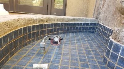 Notice the discoloration on the inner side of the fountain walls. Photo