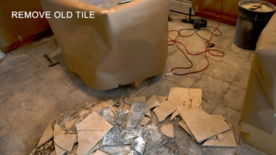 Our highly trained technicians remove not only tile, but mastic and other adhesives to prepare the slab for a new installation. Photo