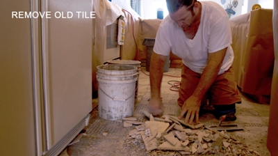 Our tile removal services include proper disposal of old tile. Photo