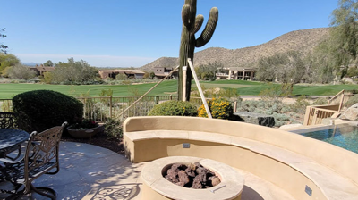 The fire feature and seating area were also in poor condition BEFORE our services. Photo