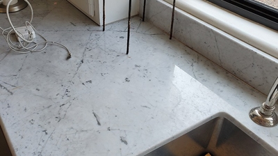 Although not as apparent as the other side of the sink, this side had some etch damage, too. Photo