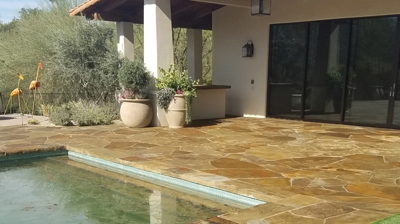 What a dramatic difference our restoration services made in this flagstone patio area! Photo