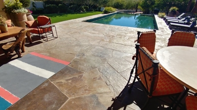 The flagstone in this outdoor living space is cleaned, sealed, and protected. Photo
