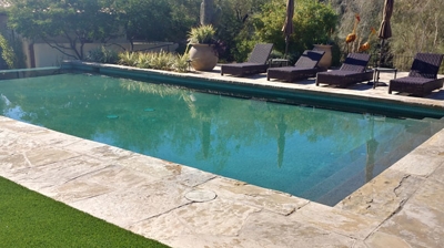 Before we stripped, cleaned, and resealed the flagstone, it looked old, dirty, and chalky. Photo