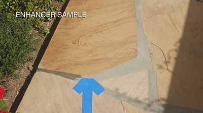 We cleaned and enhanced a single stone to demonstrate to the homeowners what kind of results they could expect. Photo