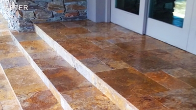 After we cleaned and sealed these travertine stairs, they looked so much better. Photo