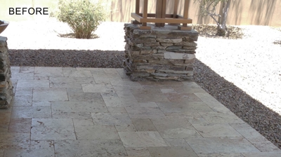 Here you can see that the travertine patio, although swept and hosed off by the homeowner, needs some professional attention. Photo