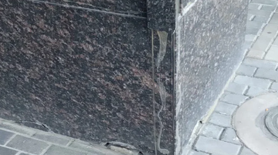 This BEFORE image shows where the stone veneer fell off. Photo