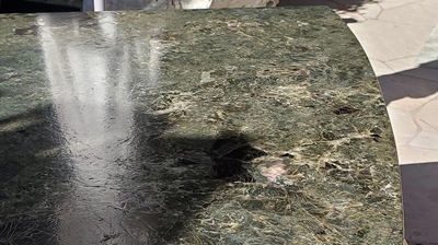 Here is a BEFORE image of the granite. The failed resin is not easy to see at this angle. Photo