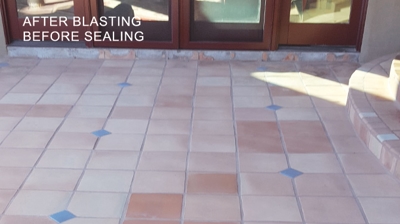 Our dustless media blasting services improved the appearance of the Saltillo significantly, but it still looked dull and chalky. Photo