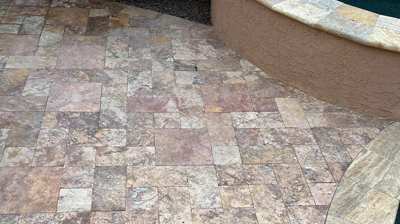 The stone next to the pool had a very faded appearance, as you can see in this BEFORE image. Photo