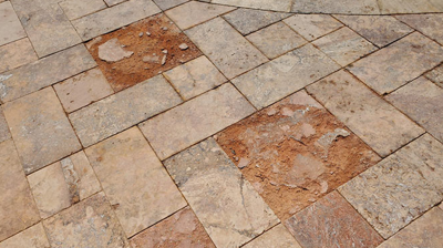 We replaced several damaged tiles. Photo