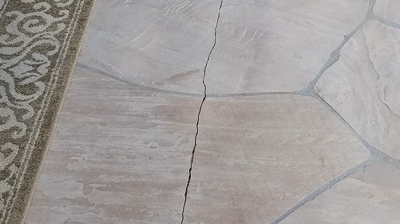 This BEFORE image shows the dullness of the flagstone. Photo