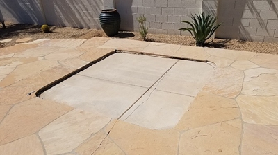 Here is the big empty space where the hot tub used to be. Photo