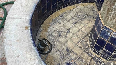 The blue tiles looked yellow because of the thick layer of scale. Photo