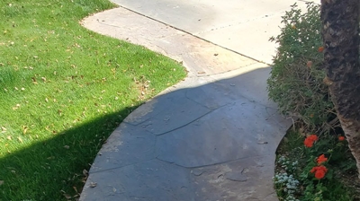 This BEFORE image shows what the flagstone looked like when we first arrived. Photo