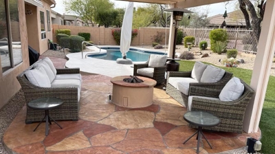 In this AFTER image, you can see the beautifully restored flagstone sitting area. Photo