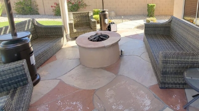 This sitting area is unsightly BEFORE our flagstone restoration. Photo