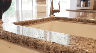 Here is the granite countertop AFTER repair and restoration. Photo