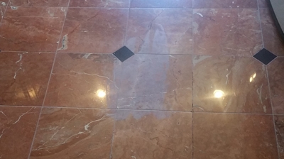 This is what the floor looked like when we arrived, before doing any granite and marble restoration work. Photo