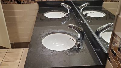 Here is a BEFORE image of the etch-damaged granite. Photo