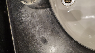 See in this BEFORE image how badly damaged the granite was when we first arrived. Photo