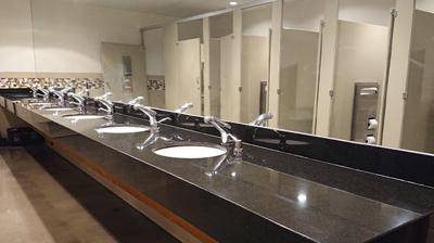 Here is another AFTER image of the refinished granite vanities. Photo