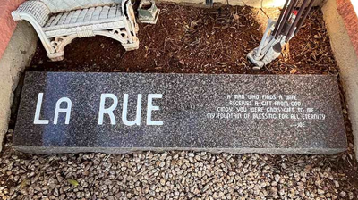 AFTER restoration, it is easy to read the message on this memorial stone. Photo