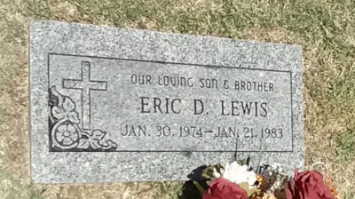 This headstone looked dark and dull before cleaning. Photo