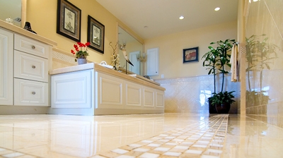 We polished, cleaned, and sealed each bathroom marble mosaic border. Photo