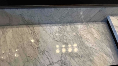 Notice the beautiful reflection of the overhead lights in the marble in this AFTER image. Photo