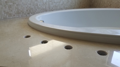 Here is the tub surround AFTER honing and polishing. Beautiful! Photo