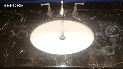 Notice the etch marks and fine scratches on this marble top. Photo