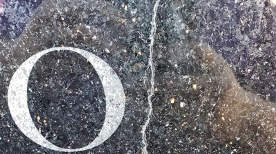 Here is a close up image of the crack in the granite statue base, taken after cleaning but prior to filling. Photo