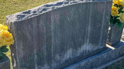 This BEFORE image shows the back side of the headstone. Photo