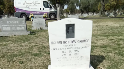 Notice the unsightly calcium buildup on this marble headstone. Photo