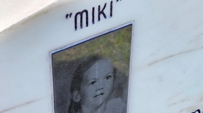 The image of the child has much more clarity after restoration. Photo