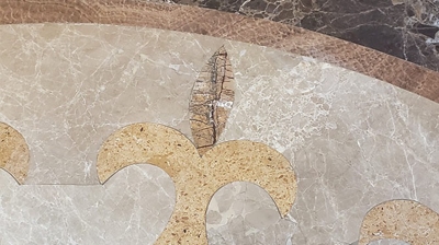 The repaired portion blends beautifully with the surrounding stone. Photo