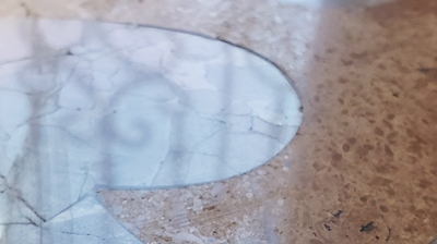 Here is a close up AFTER image of our precision stone repair. Photo