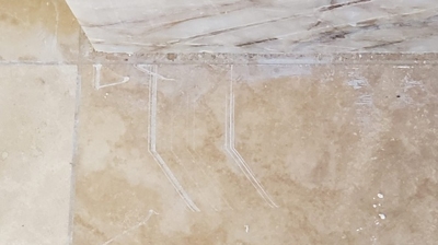 There were some pretty deep scratches, as you can see in this BEFORE image. Photo