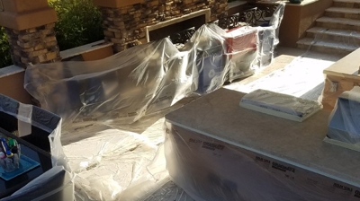 We always mask and protect surfaces surrounding our work area. Photo