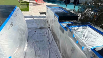 We always mask and protect the surfaces surrounding our work area. Photo