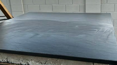 Here is the granite BEFORE restoration. Notice the streaks. Photo