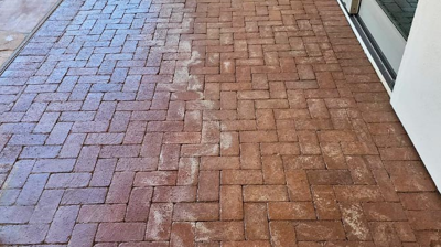 Here is another BEFORE image of the brick pavers. Photo