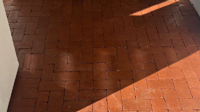 This AFTER image shows the clean and fresh brick pavers. Photo