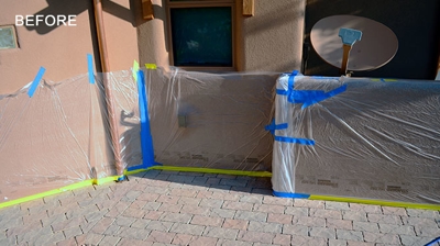 Notice how we mask and protect the surfaces surrounding our work area. Photo