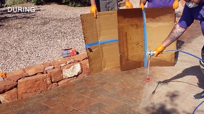 Here our experienced technicians evenly apply an advanced impregnator and premium color enhancer. Photo