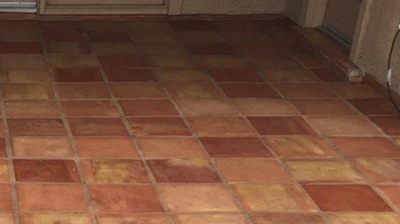 This AFTER image shows the cleaned and sealed Saltillo. Photo